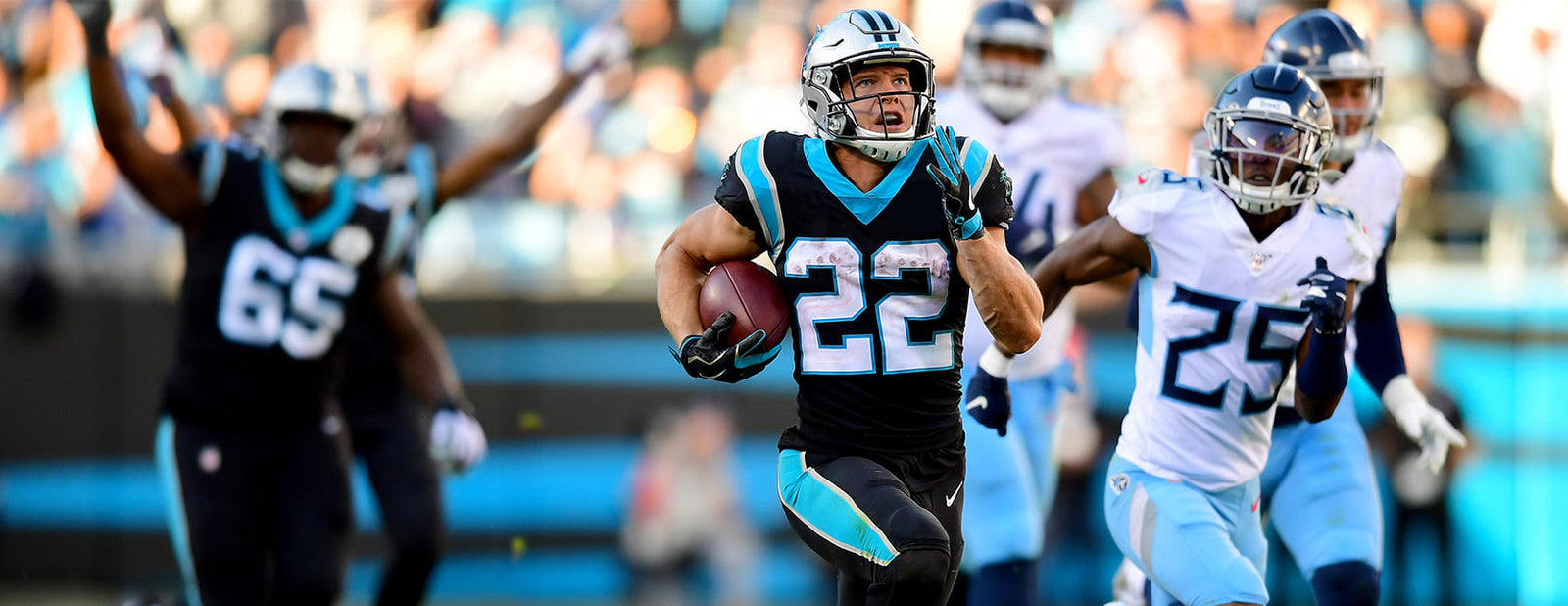 jugador de futbol americano llevando la pelota